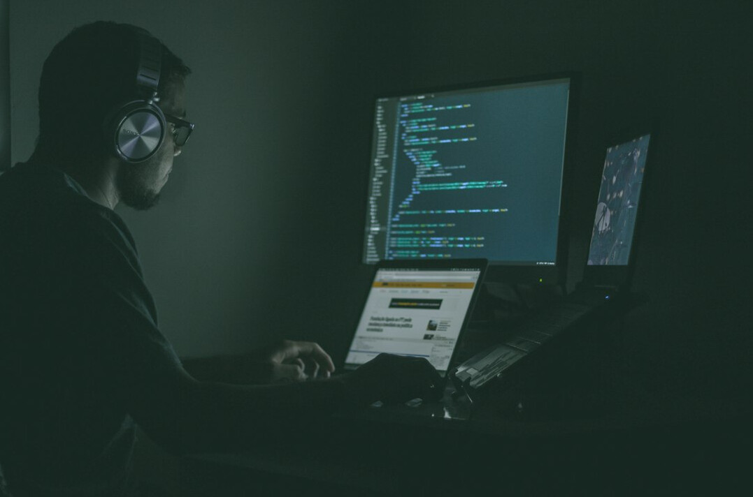 developer coding on computer