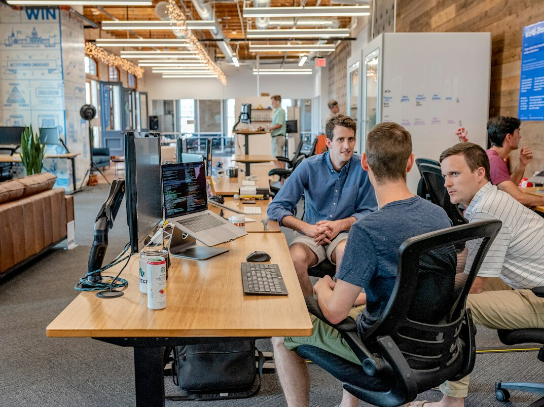 team discussing software project