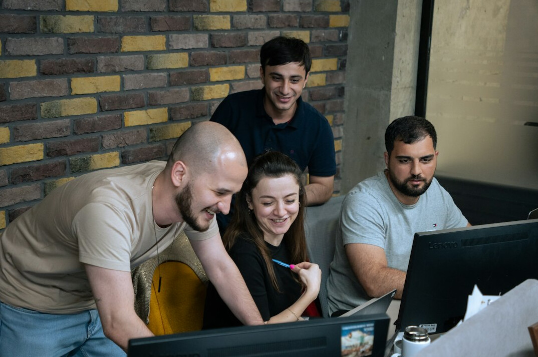 team of programmers in office